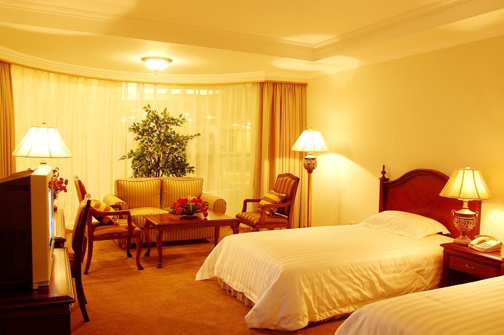 New Gloria Plaza Garden Hotel Charbin Pokoj fotografie
